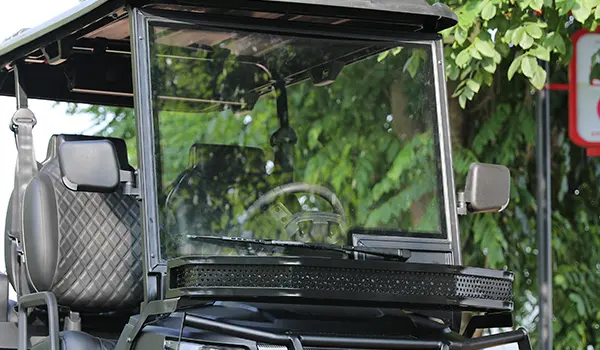 Zoomed-in view of a durable AS4-certified DOT tempered glass windshield with wiper.