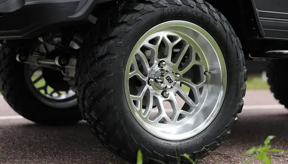 Rugged Tires and Stylish Rims Close-up of an off-road e-cart tire and rim