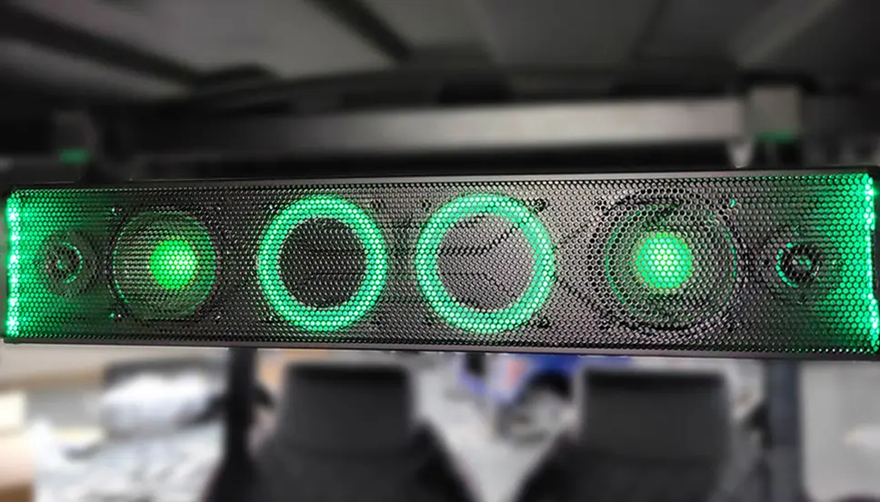 Customize Your Ride with Multi-Color LED Lighting Accents Close-up of a speaker bar with multi-color LED lighting accents in an off-road e-cart.
