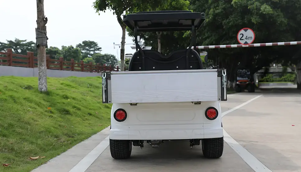 Utility E-Cart with Cargo Bed for Versatile Transport Solutions. Rear view of a utility e-cart