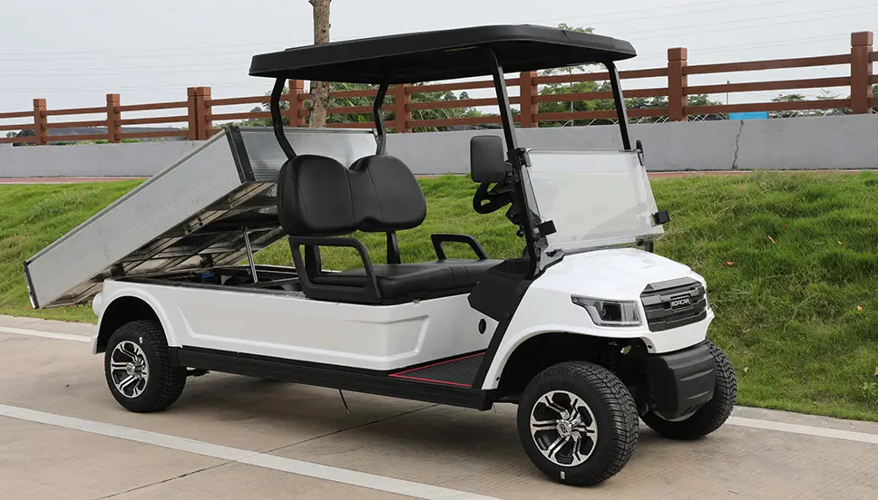 Versatile Utility E-Cart with Elevated Cargo Bed for Easy Access. Utility e-cart with a tilted cargo bed and comfortable seating for two.