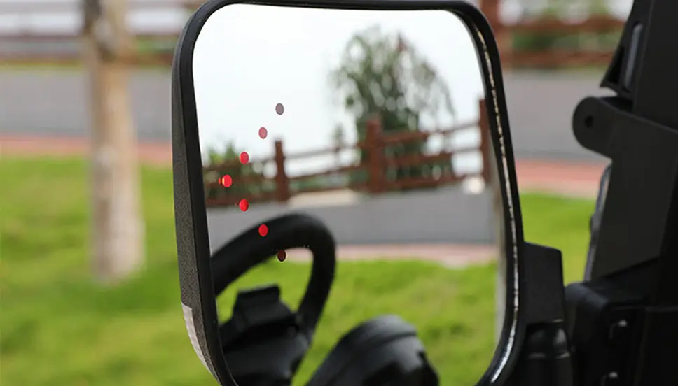 ED Turn Signal Side Mirror for Enhanced Safety and Visibility. Side mirror of a utility e-cart featuring built-in LED turn signals.